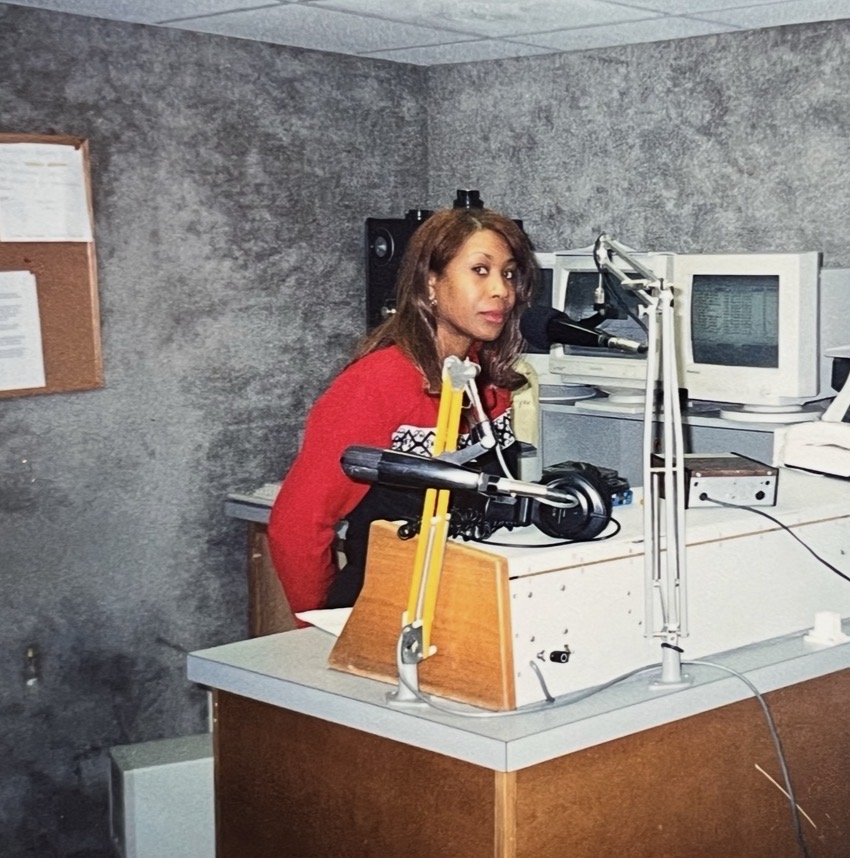 Mary Kingcannon at the microphone in her early radio studio days