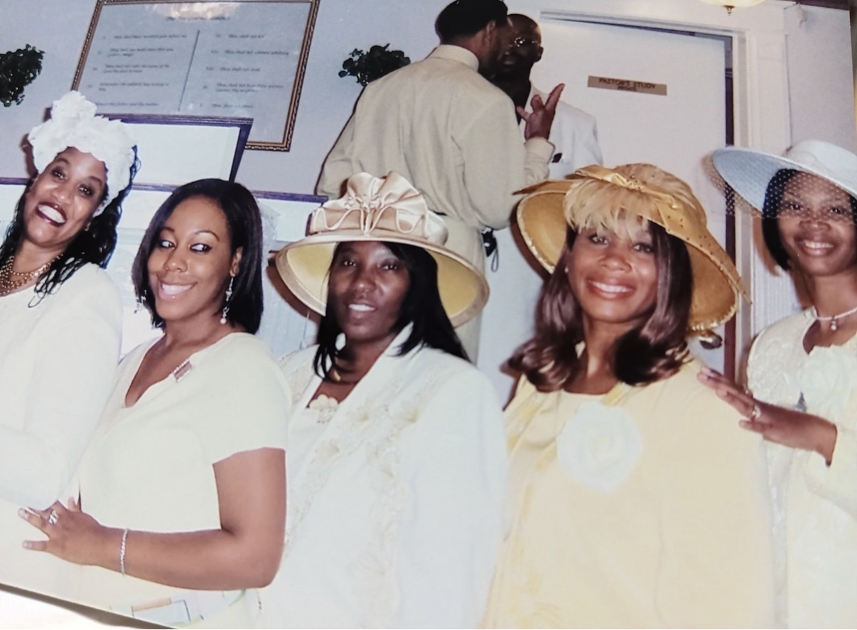 Sis. Mary Kingcannon with sisters in their Sunday hats outside the Pastor's Study