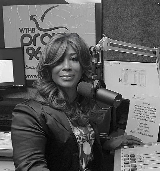 Mary Kingcannon on air at WTHB Praise 96.9