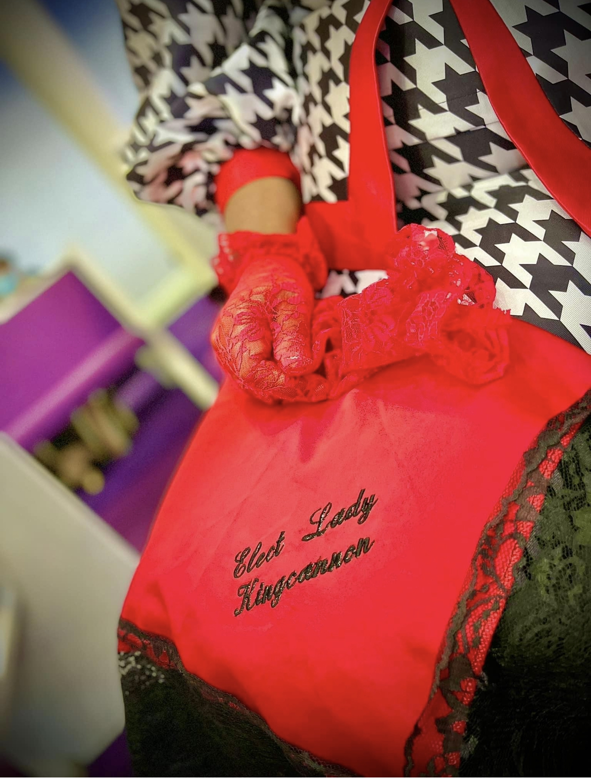 Mary's signature red lace gloves and embroidered 'Elect Lady Kingcannon' purse