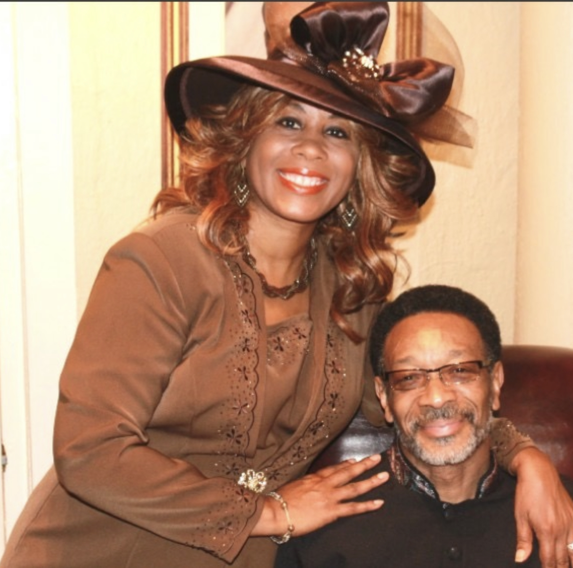 Mary Kingcannon in a brown hat with her husband Pastor David Kingcannon